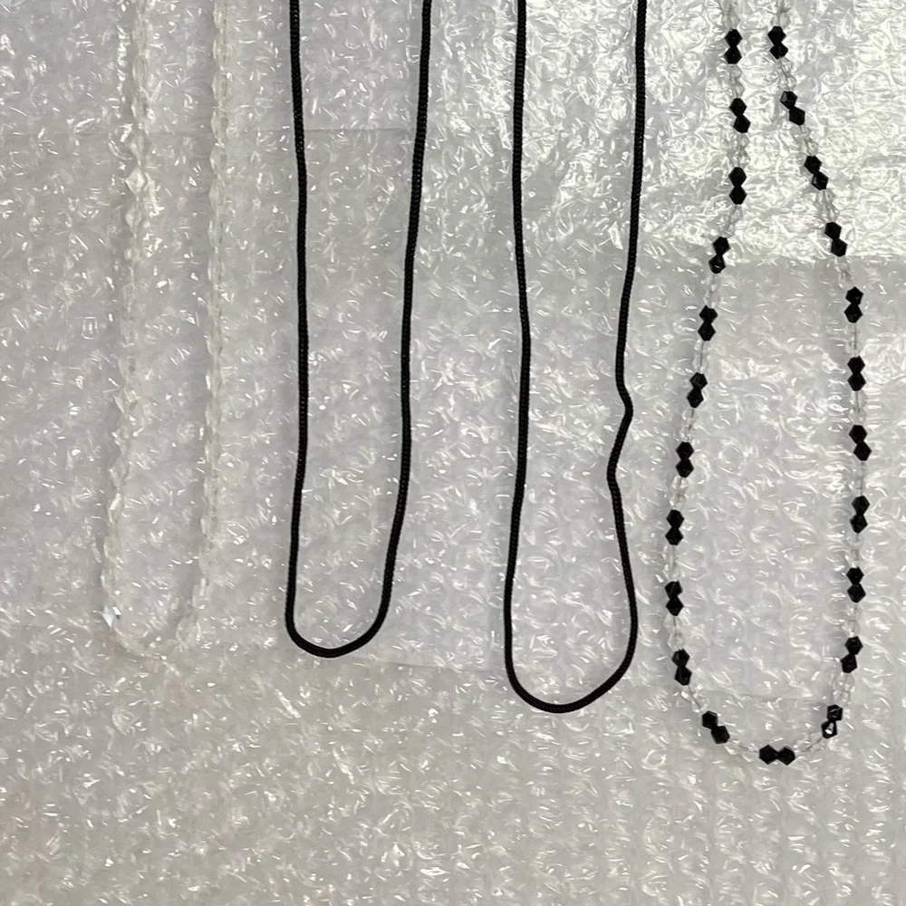 Eyeglass retainers (3) (VGUC) black & clear 26”